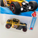 2026 Hot Wheels HW Fan Driven Bone Shaker dorado metálico con flamas 5SP