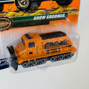 1999 Matchbox Wilderness Adventure Snow Groomer naranja con Tolva Móvil Primera Edición - Detalle Burbuja