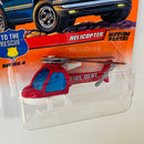 1998 Matchbox Moving Parts To The Rescue Helicopter rojo Bombero con Hélices Rotativas - Detalle Burbuja