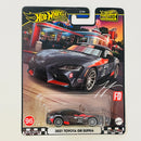 2024 Hot Wheels Premium Boulevard Larry Chen Canon 2021 Toyota GR Supra gris oscuro metálico Llantas de Goma RR