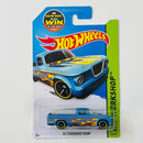 2015 Hot Wheels HW Workshop 63 Studebaker Champ celeste con flamas MC5
