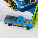 2015 Hot Wheels HW Workshop 63 Studebaker Champ celeste con flamas MC5