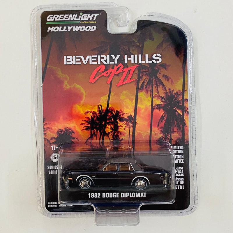 2021 Greenlight Hollywood Limited Edition Beverly Hills Cop II Un Detective Suelto en Hollywood 2 1982 Dodge Diplomat negro Llantas de Goma