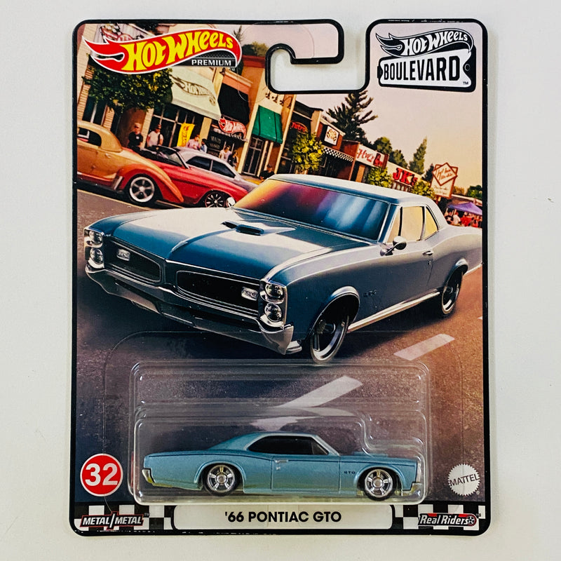 2021 Hot Wheels Premium Boulevard 66 Pontiac GTO celeste metálico Llantas de Goma RR base ZAMAC