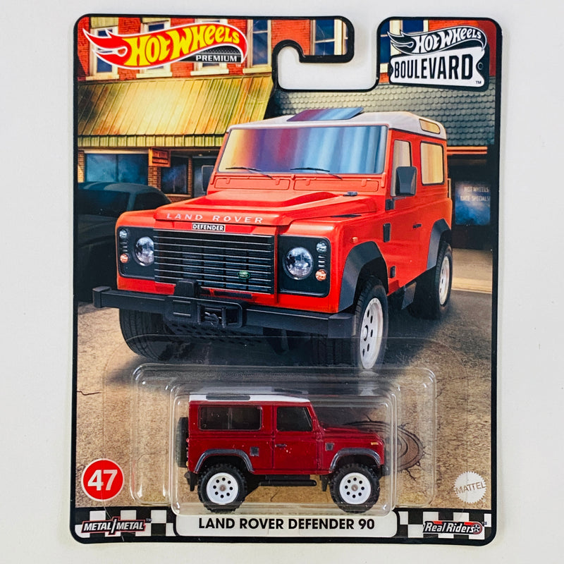 2022 Hot Wheels Premium Boulevard Land Rover Defender 90 rojo metálico Llantas de Goma RR