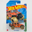 2022 Hot Wheels Treasure Hunt Mud Studs 17 Jeep Wrangler naranja BLOR