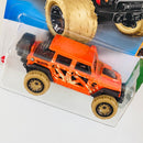 2022 Hot Wheels Treasure Hunt Mud Studs 17 Jeep Wrangler naranja BLOR