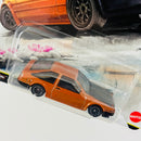 2026 Hot Wheels Premium Car Culture 10th Anniversary Japan Historics 5 Toyota AE86 Sprinter Trueno naranja metálico Llantas de Goma RR