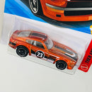 2026 Hot Wheels Then and Now Datsun 240Z Nissan naranja metálico RSW