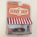 2024 Greenlight The Hobby Shop Series 16 2020 Nissan 370Z with Race Car Driver negro Llantas de Goma con Figura Diorama