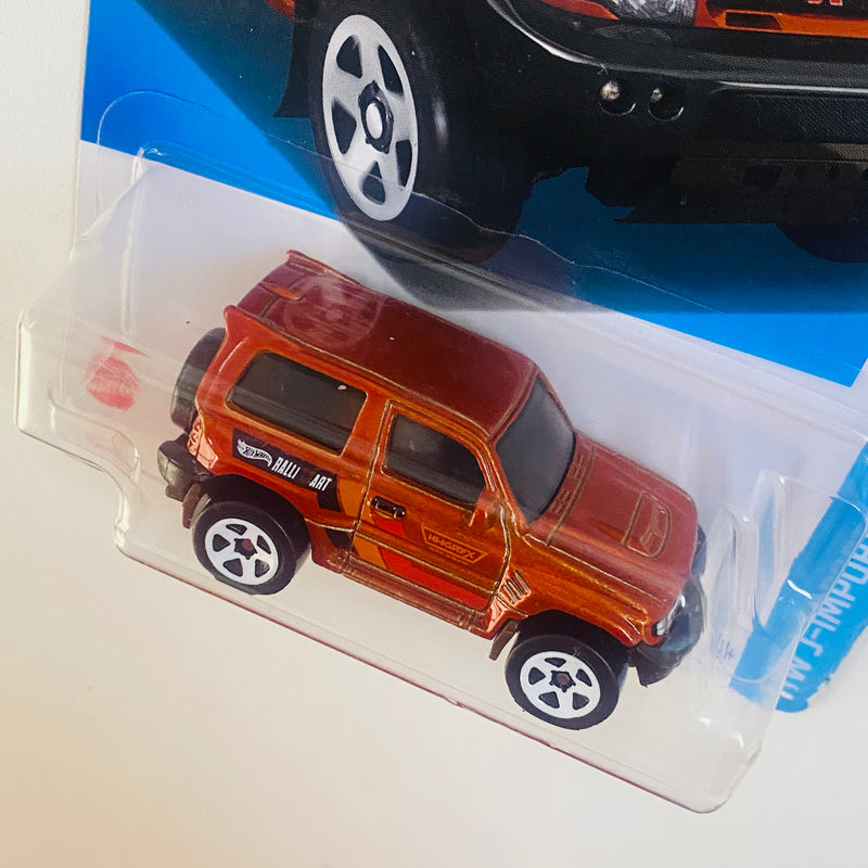2024 Hot Wheels HW J-Imports Mitsubishi Pajero Evolution naranja metálico 5SP - Básico del STH
