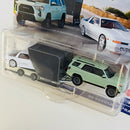 2024 Hot Wheels Premium Car Culture Team Transport 18 Toyota 4Runner, Open Trailer y 89 Toyota Supra con Llantas de Goma RR
