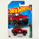 2022 Hot Wheels Mud Studs 21 Ford Bronco rojo metálico BLOR