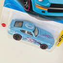 2025 Hot Wheels HW Art Cars Datsun 240Z Nissan celeste con flores sakura J5