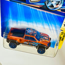 2004 Hot Wheels Scrapheads Mega-Duty naranja metálico Y5 base ZAMAC