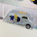 2023 Hot Wheels Premium Pop Culture Disney 100 Aniversario Alicia en el País de las Maravillas Deco Delivery celeste Llantas de Goma RR base ZAMAC