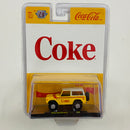 2023 M2 Machines Coca Cola Coke Limited Edition 1/9,250 1976 Ford Bronco A28 amarillo Llantas de Goma - Detalle Burbuja