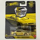 2026 Hot Wheels Premium GOLD CHASE de Edición Limitada Car Culture 10th Anniversary Vintage Racing Nissan Skyline GT-R BNR32 dorado metálico Llantas de Goma RR
