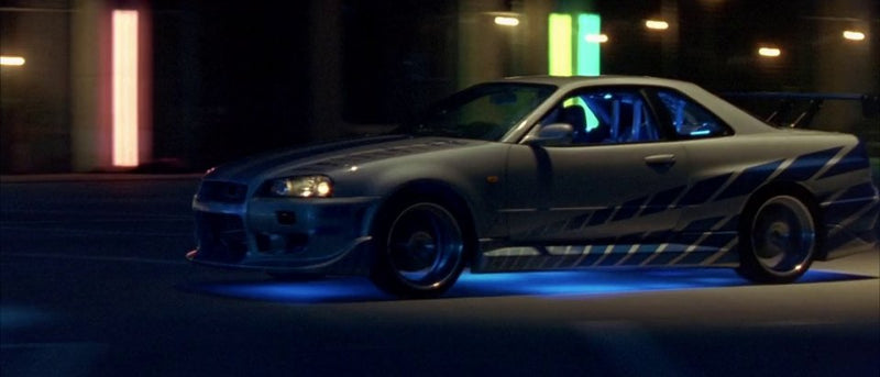 2025 Hot Wheels Monster Trucks Fast & Furious Rápidos y Furiosos Nissan Skyline GT-R R34 plata metálico MT con Auto Aplastable