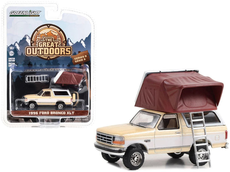 2023 Greenlight Limited Edition The Great Outdoors Series 3 1996 Ford Bronco XLT beige Llantas de Goma con Accesorios de Camping