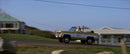 2026 Hot Wheels Premium Pop Culture Jaws Tiburón 75 Chevy Blazer Custom beige con blanco Llantas de Goma RR base ZAMAC