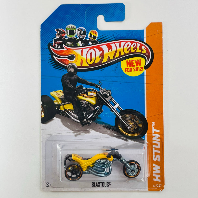 2012 Hot Wheels HW Stunt Blastous amarillo OH5 con MC5 Primera Edición