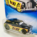 2009 Hot Wheels HW City Works Cockney Cab II negro con dorado OH5