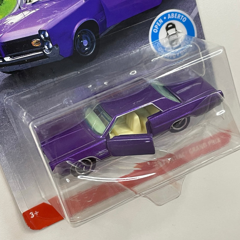 2019 Matchbox Moving Parts MBX Road Trip 64 Pontiac Grand Prix morado