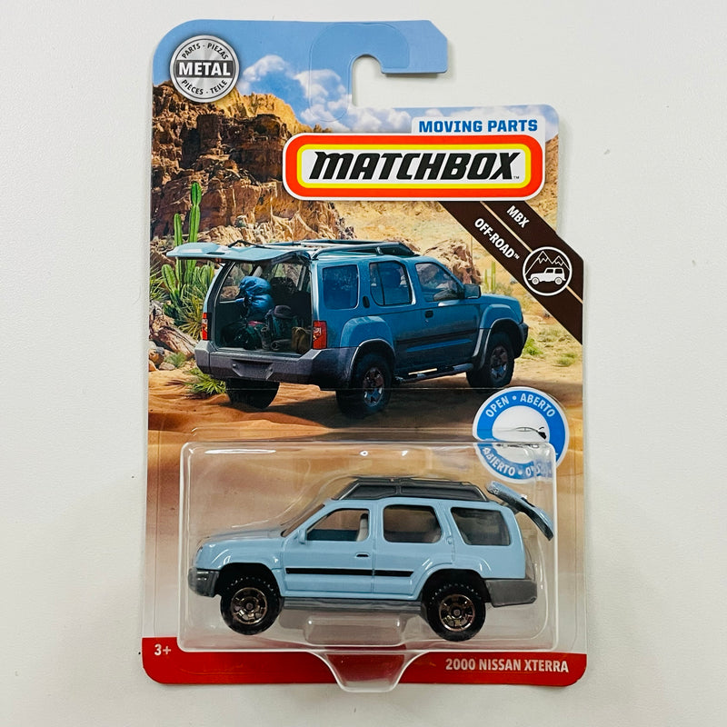 2019 Matchbox Moving Parts MBX Off-Road 2000 Nissan Xterra celeste