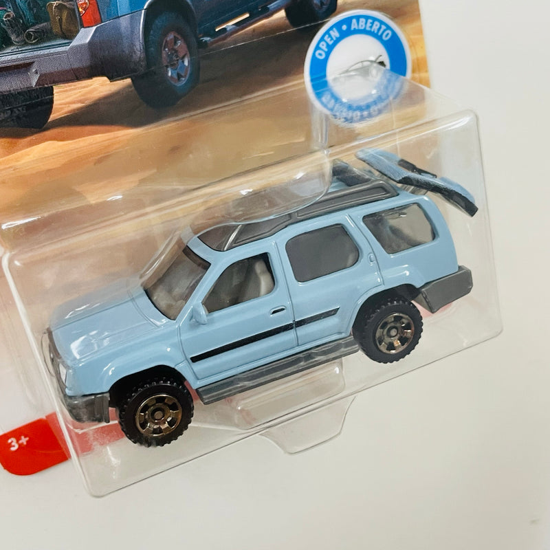 2019 Matchbox Moving Parts MBX Off-Road 2000 Nissan Xterra celeste