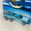 2006 Hot Wheels Tow Jam 127 turquesa metálico con flamas Y5