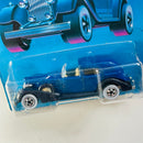 1989 Hot Wheels Classics Classic Caddy azul metálico claro WW base ZAMAC