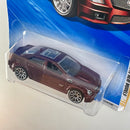 2010 Hot Wheels New Models 09 Cadillac CTS-V rojo metálico 10SP