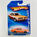 2010 Hot Wheels Muscle Mania 69 Pontiac GTO Judge naranja metálico MC5