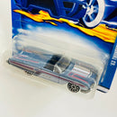2003 Hot Wheels 63 Ford Thunderbird 119 celeste metálico 10SP base ZAMAC