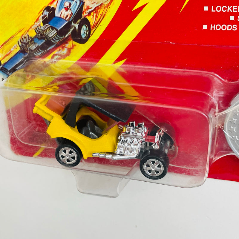 1995 Johnny Lightning The Challengers Commemorative Limited Edition Series 2 T.N.T. amarillo con Moneda Coleccionista