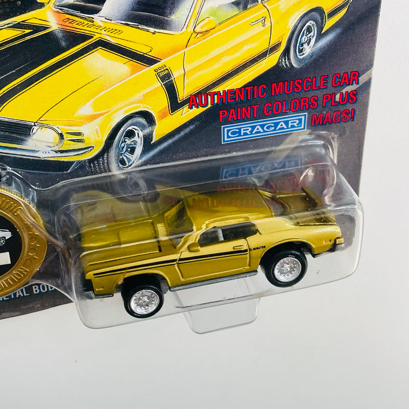 1994 Johnny Lightning Muscle Cars USA Limited Edition 1969 Mercury Cougar Eliminator dorado con Moneda Coleccionista