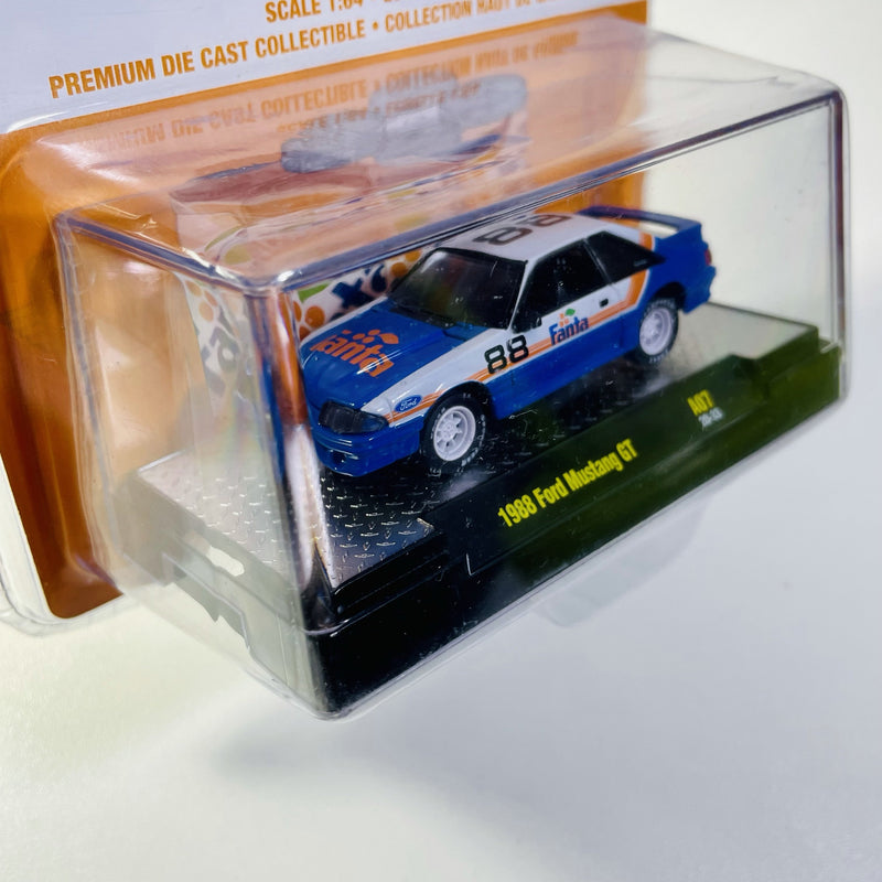 2021 M2 Machines Limited Edition 1/9,600 Fanta 1988 Ford Mustang GT A07 azul con blanco Llantas de Goma