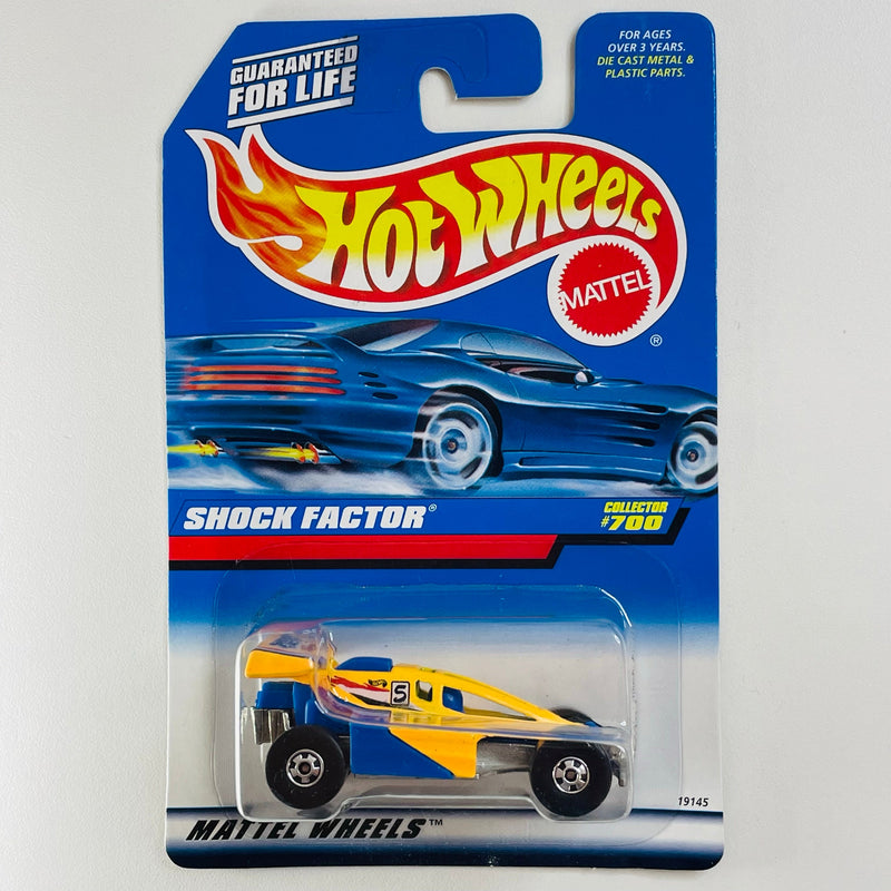 1998 Hot Wheels Shock Factor 700 amarillo con azul BW base ZAMAC Blíster 90s