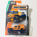 2015 Matchbox MBX Explorers Jeep Wrangler Superlift naranja