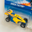 1998 Hot Wheels Shock Factor 700 amarillo con azul BW base ZAMAC