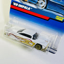 1999 Hot Wheels 59 Chevy Impala 1000 blanco LW