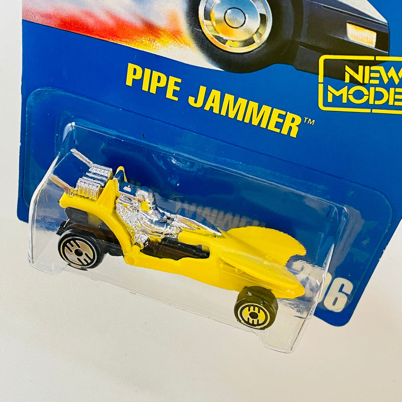 1993 Hot Wheels Pipe Jammer 206 amarillo UH Primera Edición