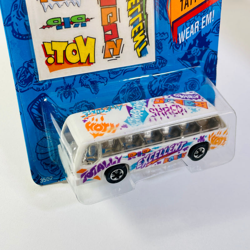 1993 Hot Wheels Tattoo Machines Bus Boys Rapid Transit blanco BW base ZAMAC