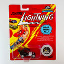 1995 Johnny Lightning The Challengers Commemorative Limited Edition Series 4 T.N.T. negro con Moneda Coleccionista