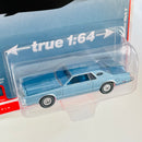 2021 Auto World Luxury Cruisers Limited Edition 1/16,206 1977 Lincoln Continental Mark V celeste metálico Llantas de Goma