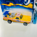 2003 Hot Wheels Wild Wave 69 El Camino Chevrolet 055 amarillo 5SP base ZAMAC