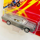 1995 Johnny Lightning The Challengers Commemorative Limited Edition Series 5 Custom Lincoln Continental gris Redline con Moneda Coleccionista